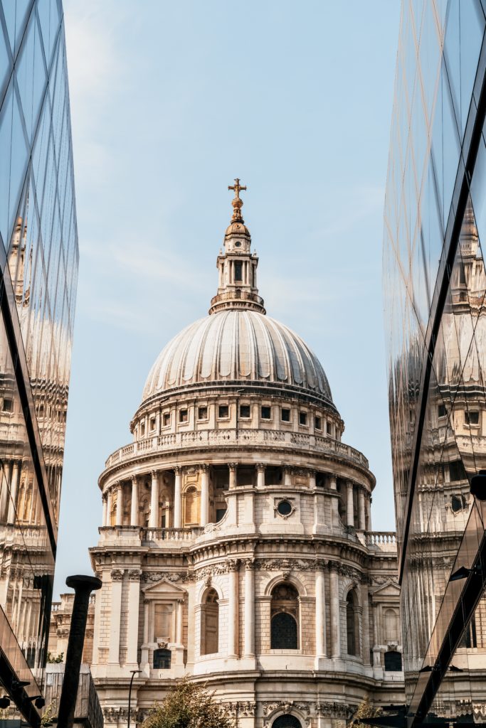 St. Paul's Cathedral church reflected in glass walls of One New Change 