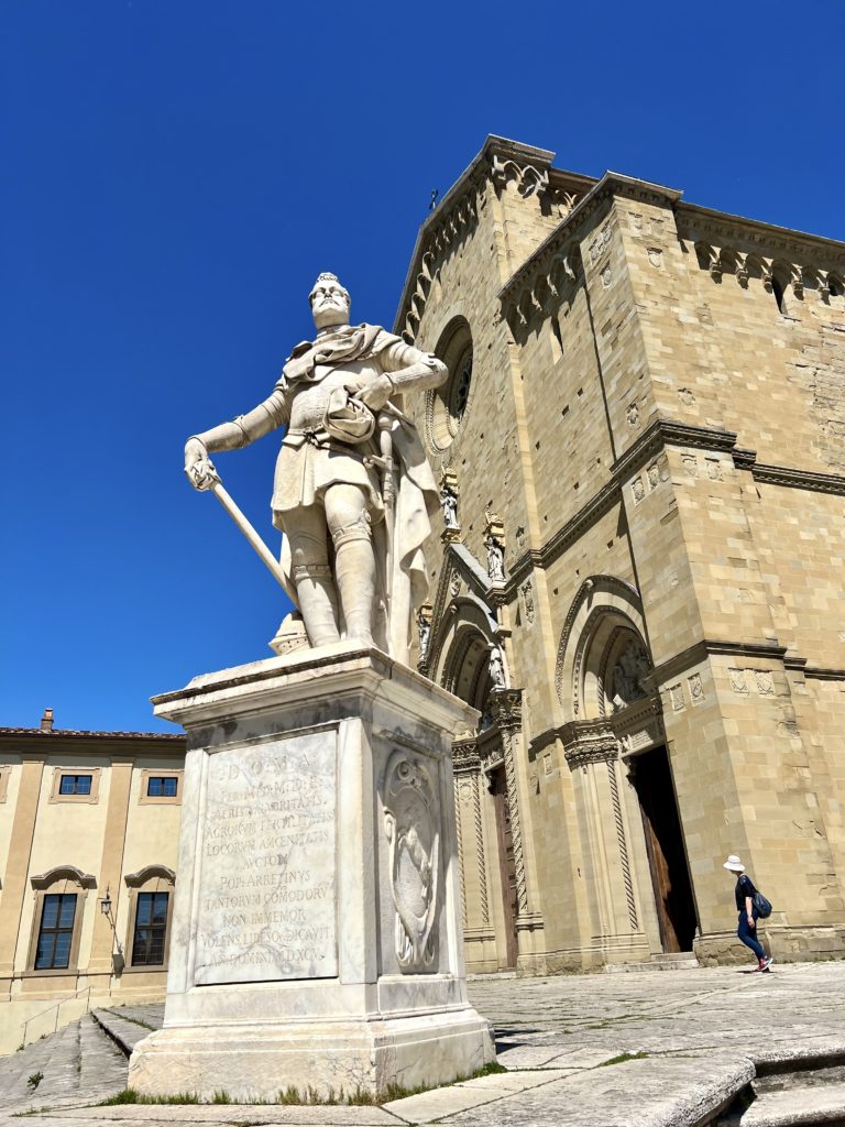 statue of Ferdinando de' Medici in front of Arezzo Cathedral