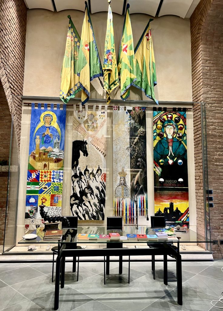 Museum of the Caterpillar contrada with Palio banners