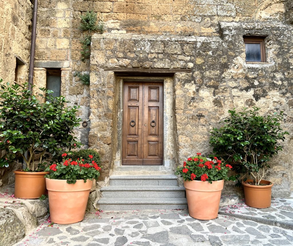 flower pots at a home on a pretty street