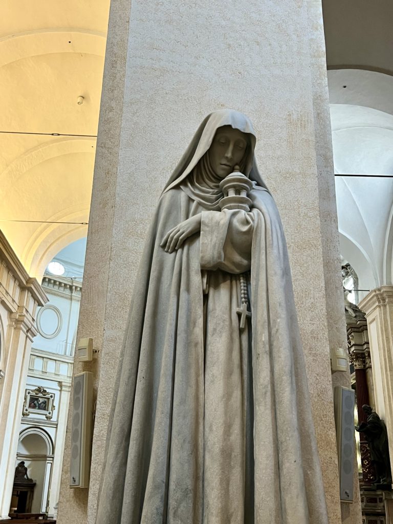 statue of Clare in Assisi Cathedral