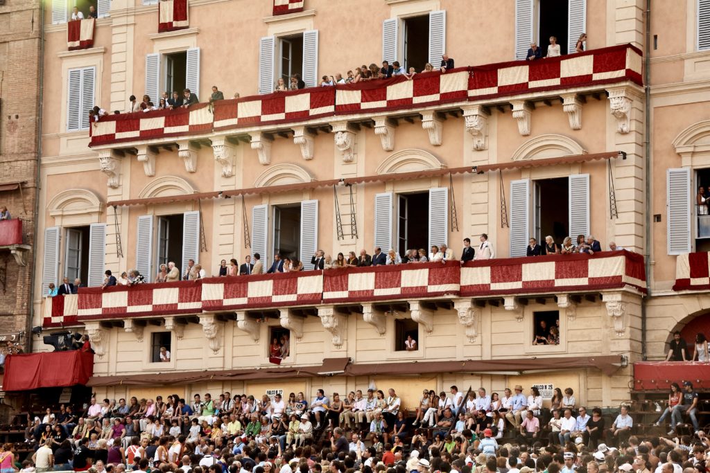 VIP spectators getting ready to watch the Palio race