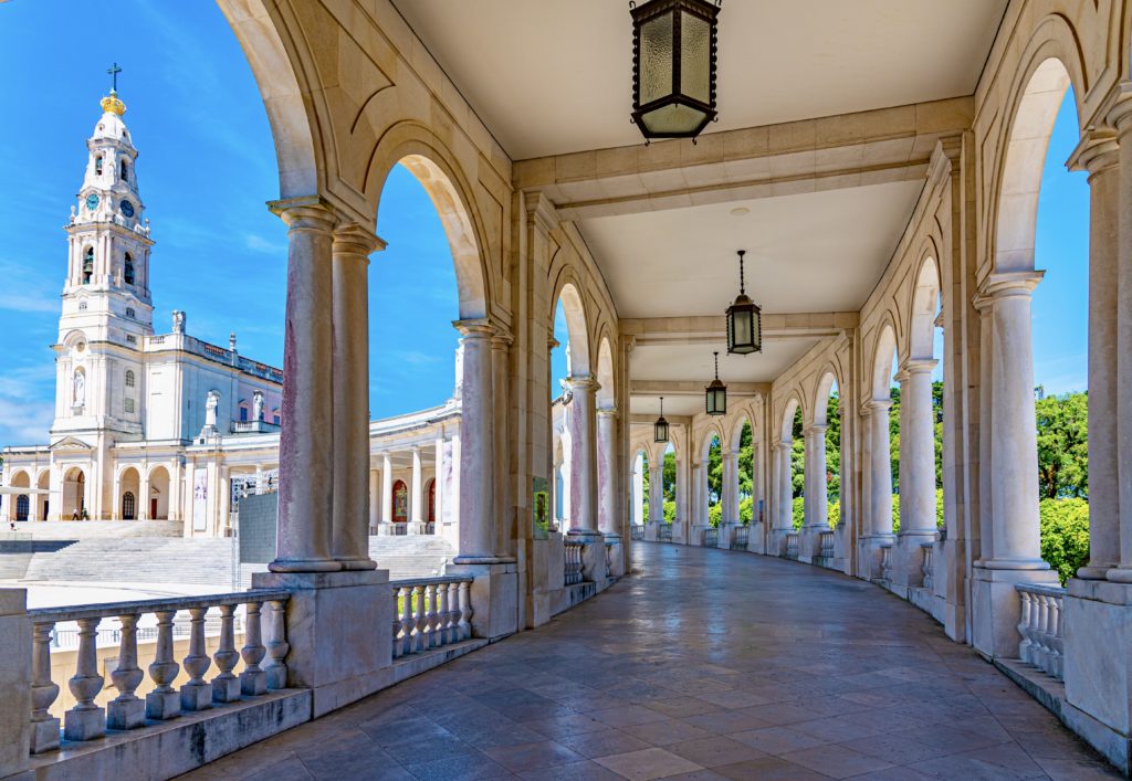 arcade of the famous sanctuary of Fatima, a great day trip from Lisbon if you're on the monastery trail