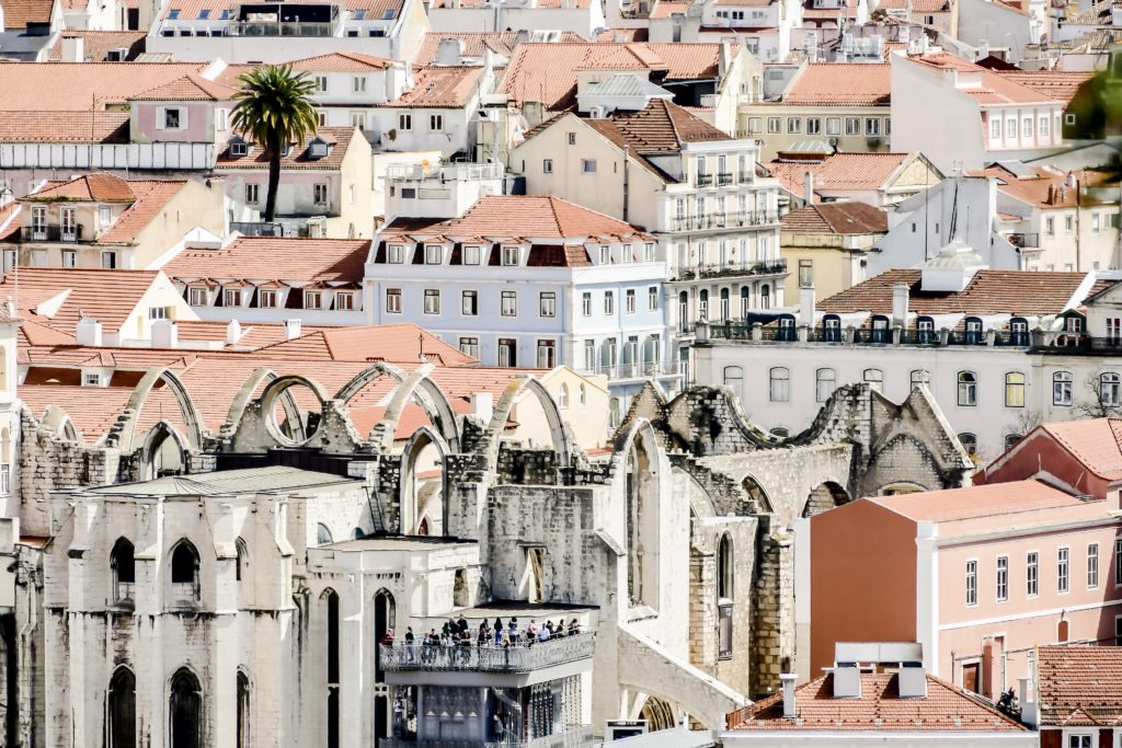 view of Carmo Convent and facades of Lisbon