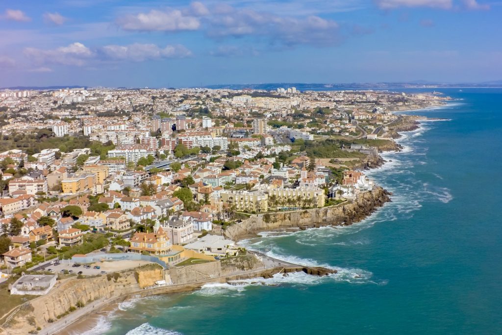 portugal places to visit in lisbon aerial view of Estoril coastline near Lisbon