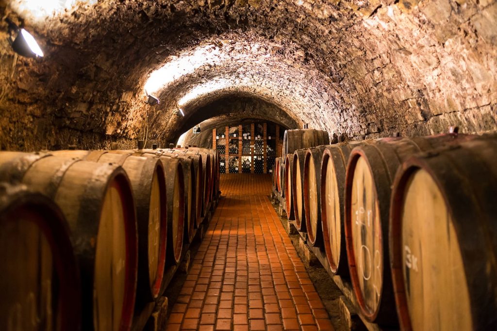port wine barrels in a Vila Nova de Gaia port wine cellar