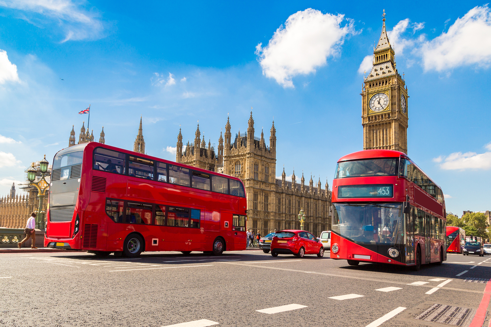 buses in front of Big Ben and the Houses of Parliament