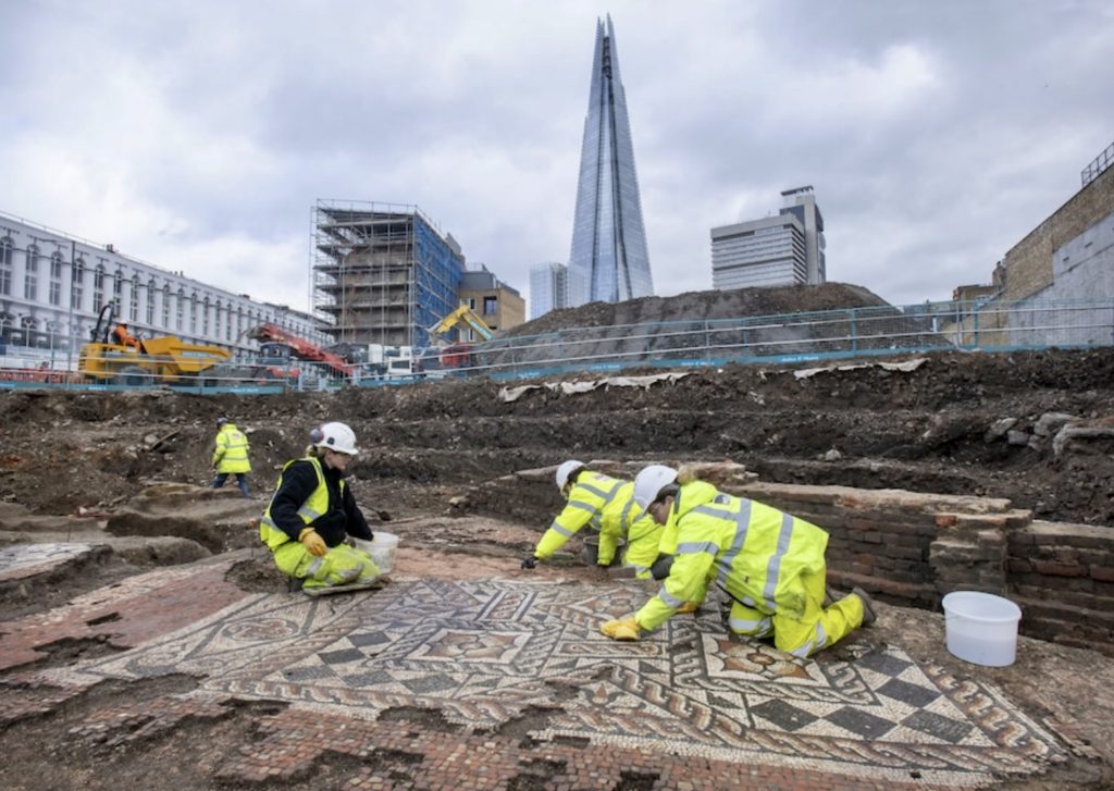archaeologists uncovering Roman mosaic in Southwark