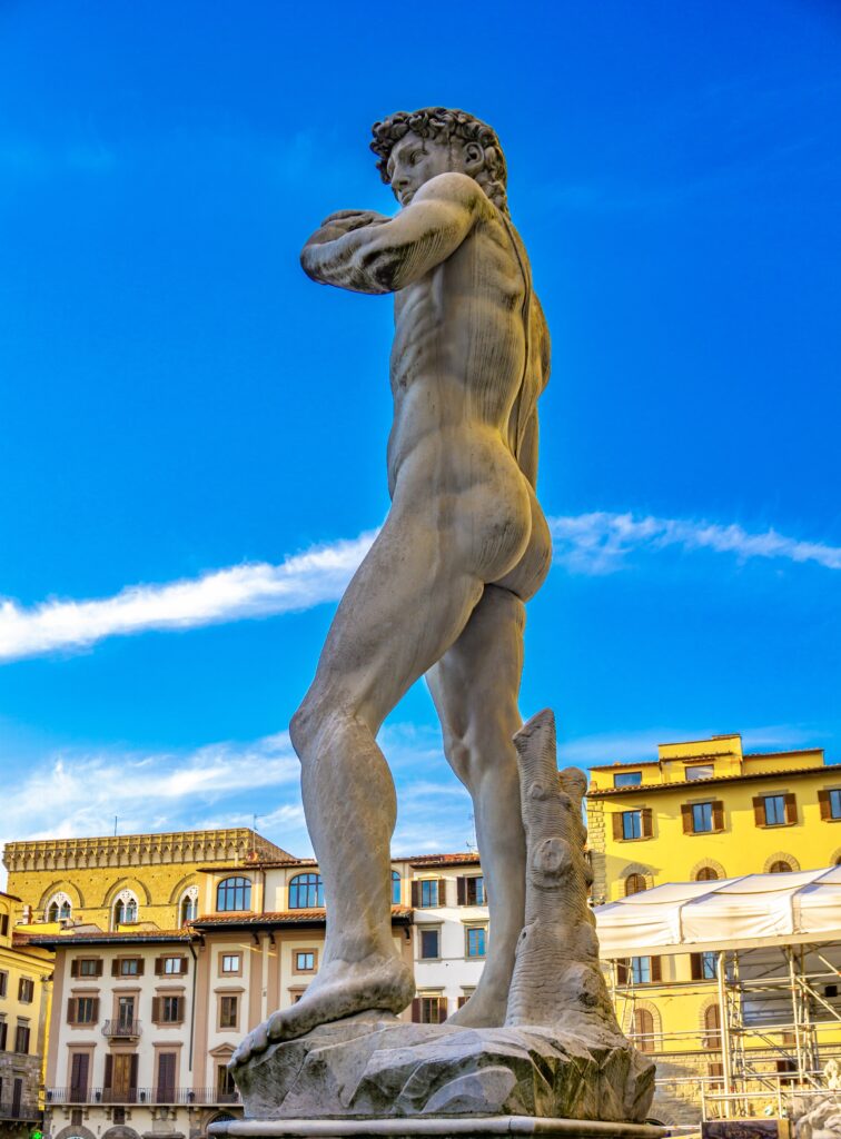 reproduction of Michelangelo's David in front of Palazzo Vecchio
