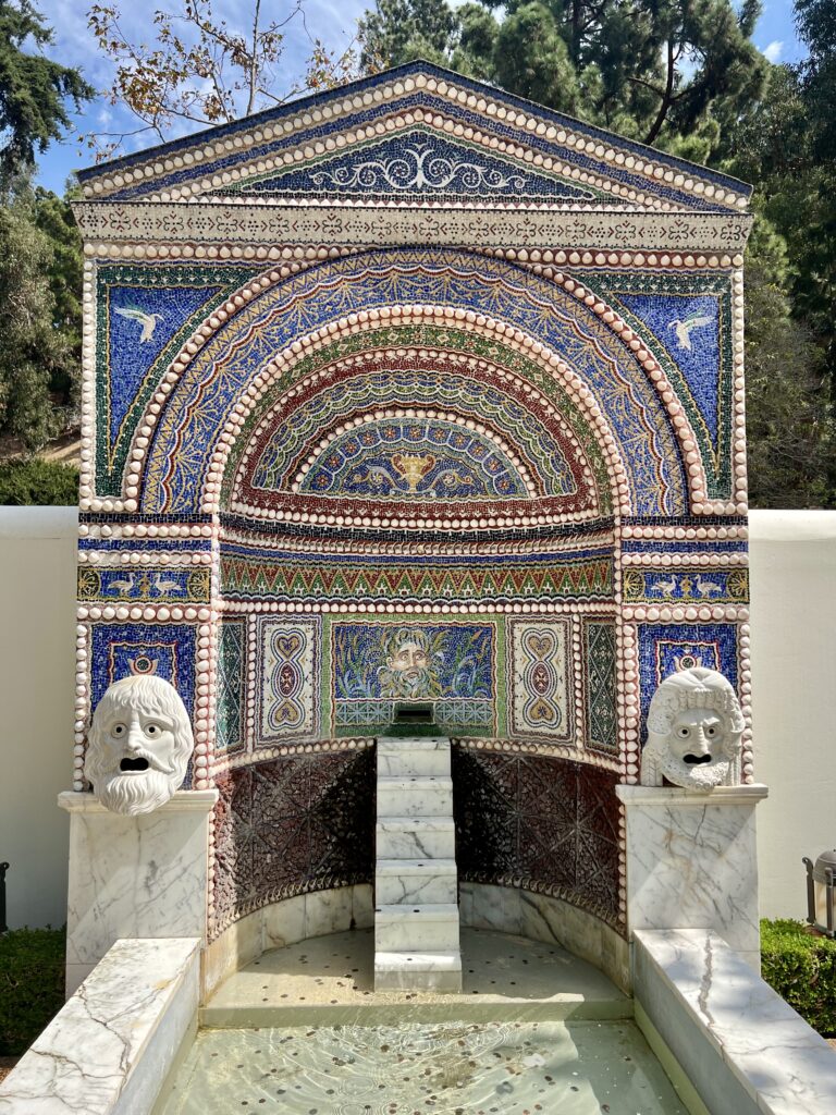 colorful mosaic fountain copied from the House of the Great Fountain in Pompeii