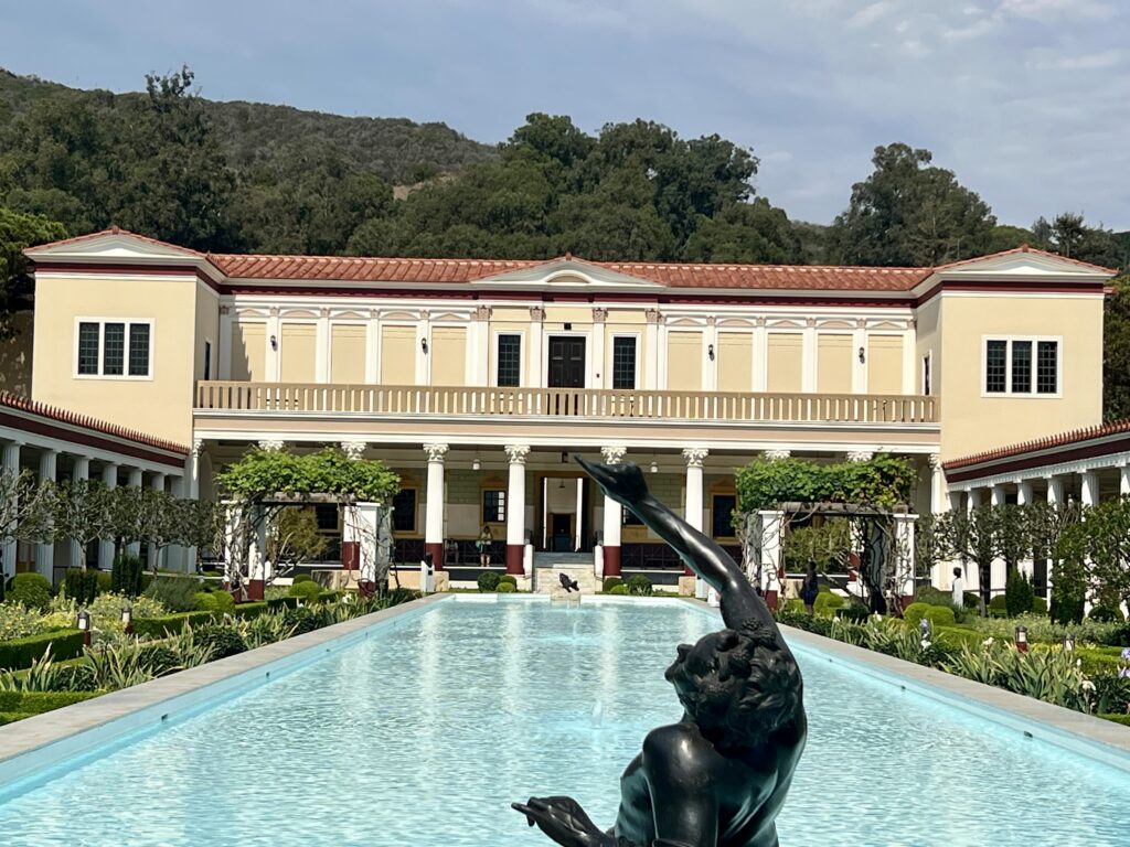 outer peristyle with a statue of an aging drunken satyr 