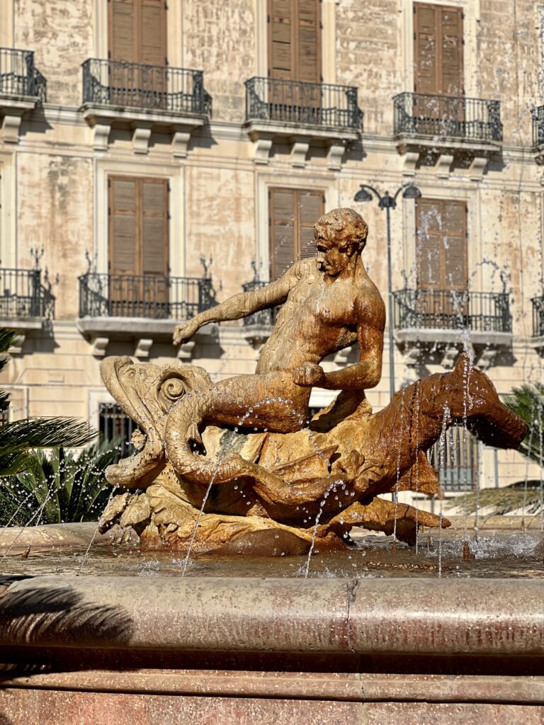 triton sculpture on the Diana Fountain
