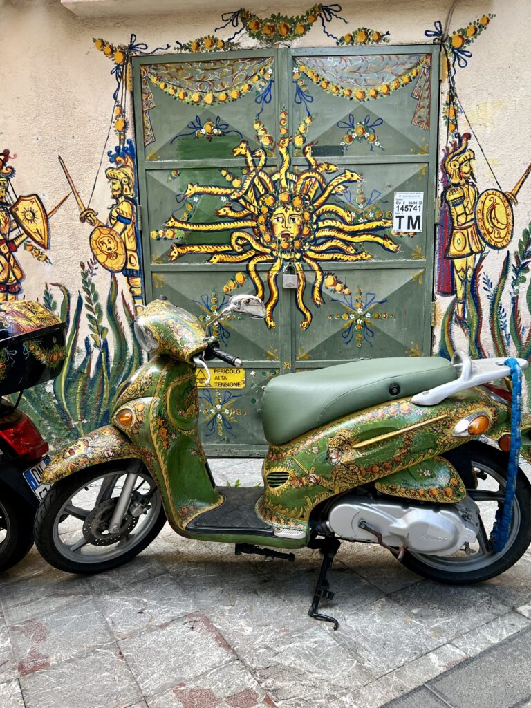 colorful painted motorcycle and street art fresco