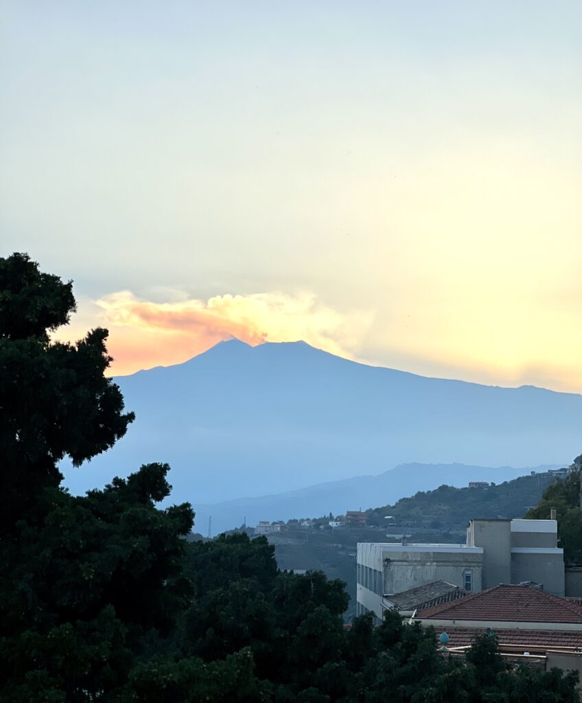 view of Mt. Etna from the sky bar of the Hotel Continental in Taormina