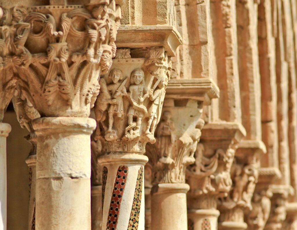 intricate capitals in the cloister of Monreale Cathedral