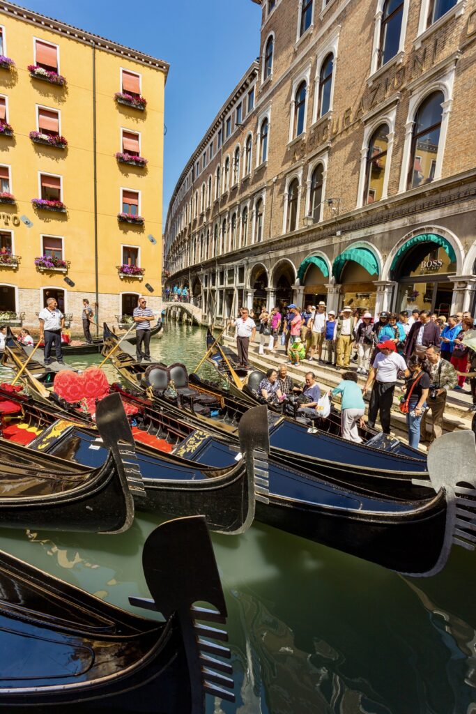a gondola ride is a must do with 2 weeks in Italy
