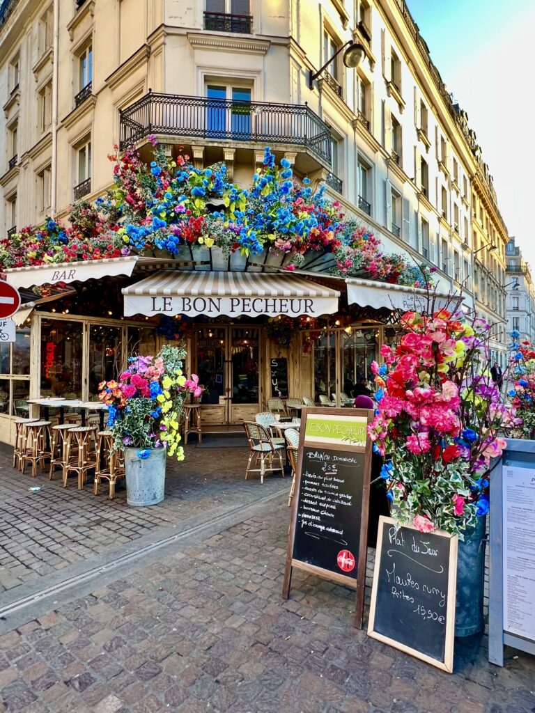 Le Bon Pecheur, with a floral display that makes it one of the most beautiful cafes in Paris