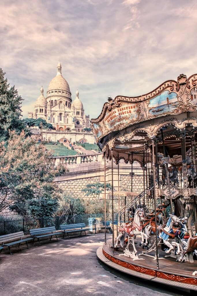 carousel and the Sacre Coeur, a top attraction in Montmartre