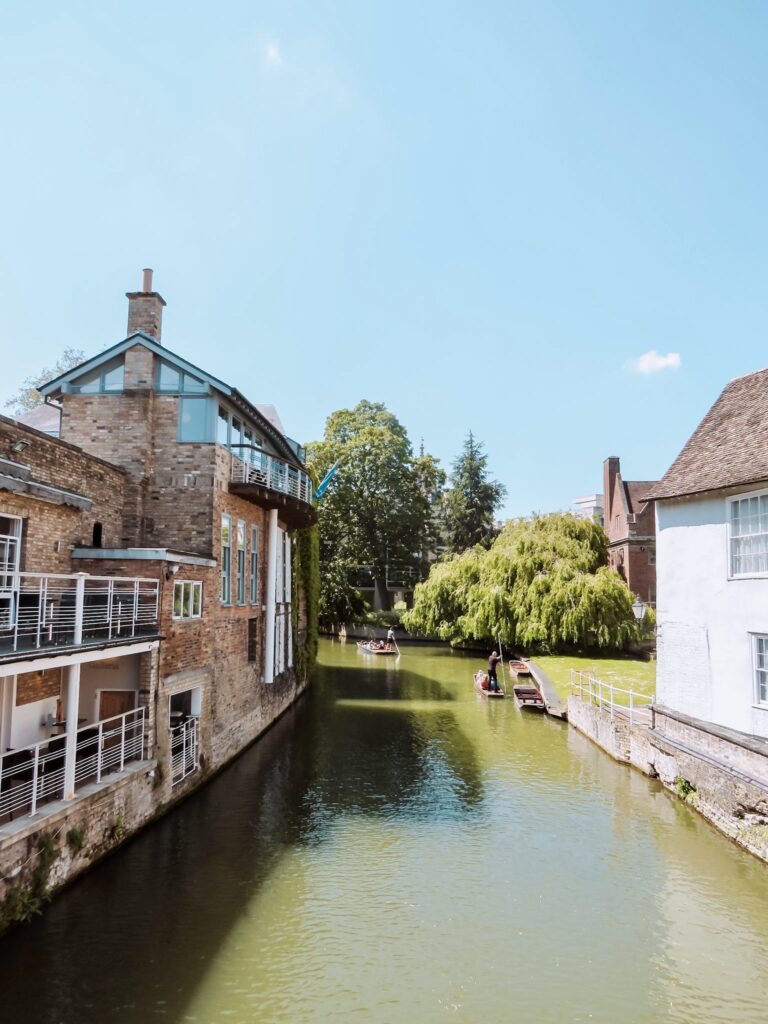 punting on the River Cam, a must do on a Cambridge day trip from London