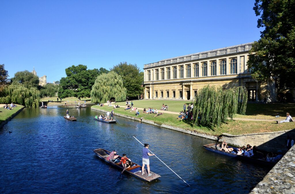 punting by the Wren Library built in at Trinity College