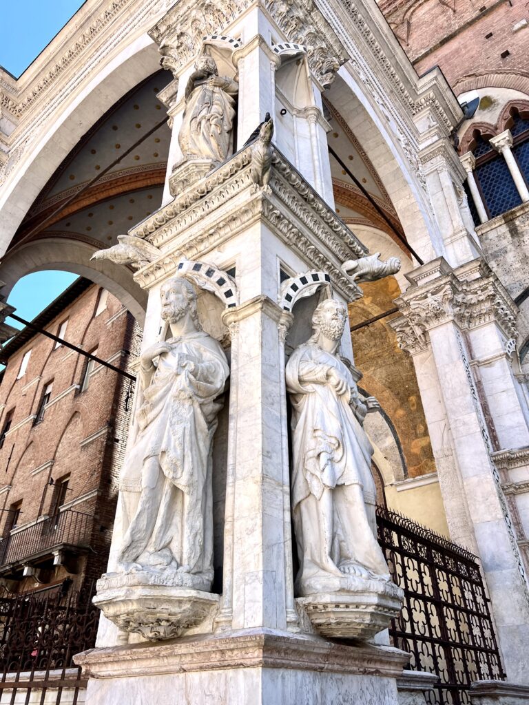 sculptures on the portico of Palazzo Pubblico