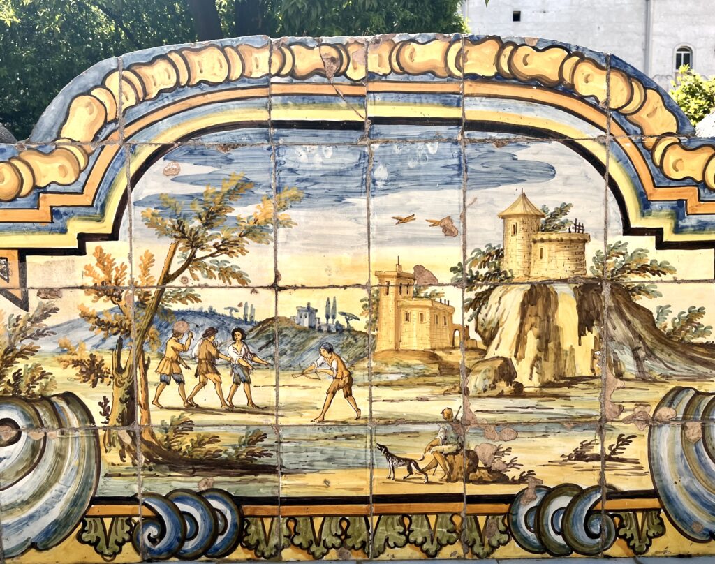 country scene on a majolica bench