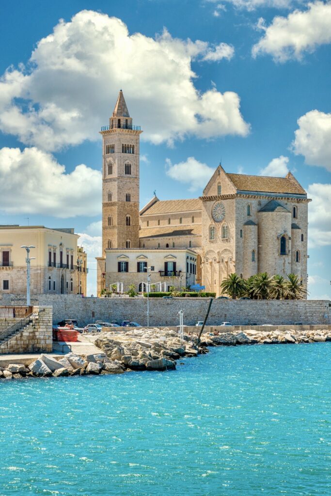 view of Trani Cathedral against blue water