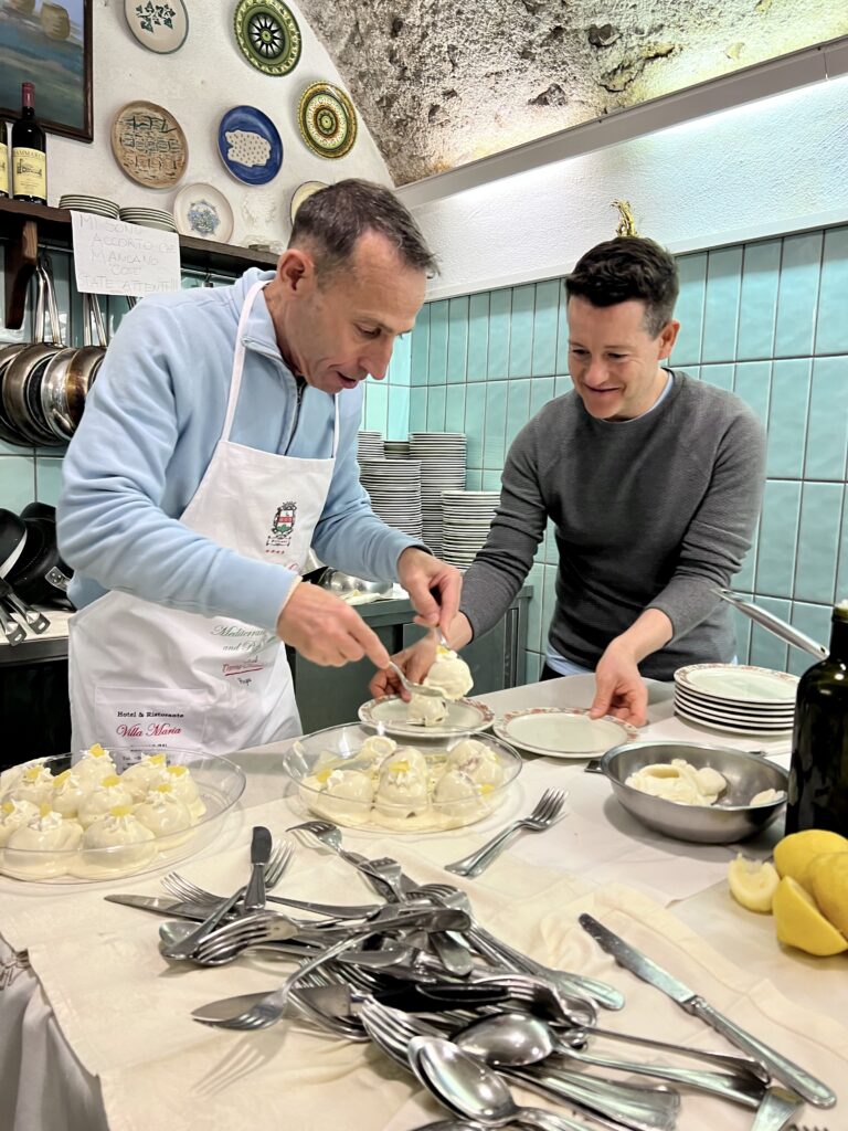 Scott and Chema preparing dessert