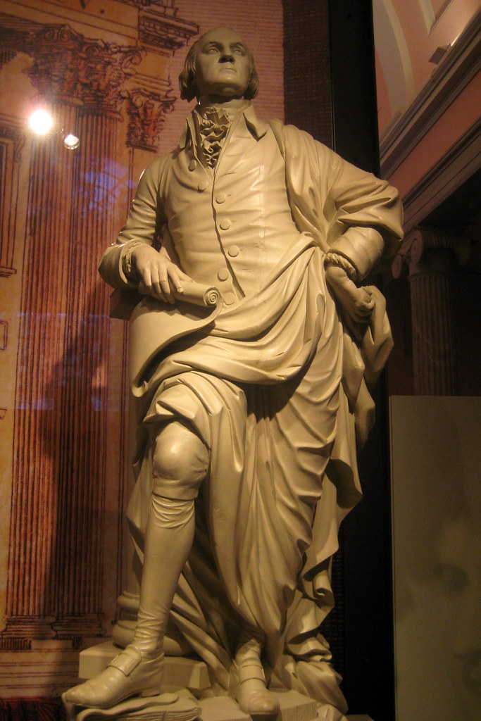 sculpture of George Washington in a toga