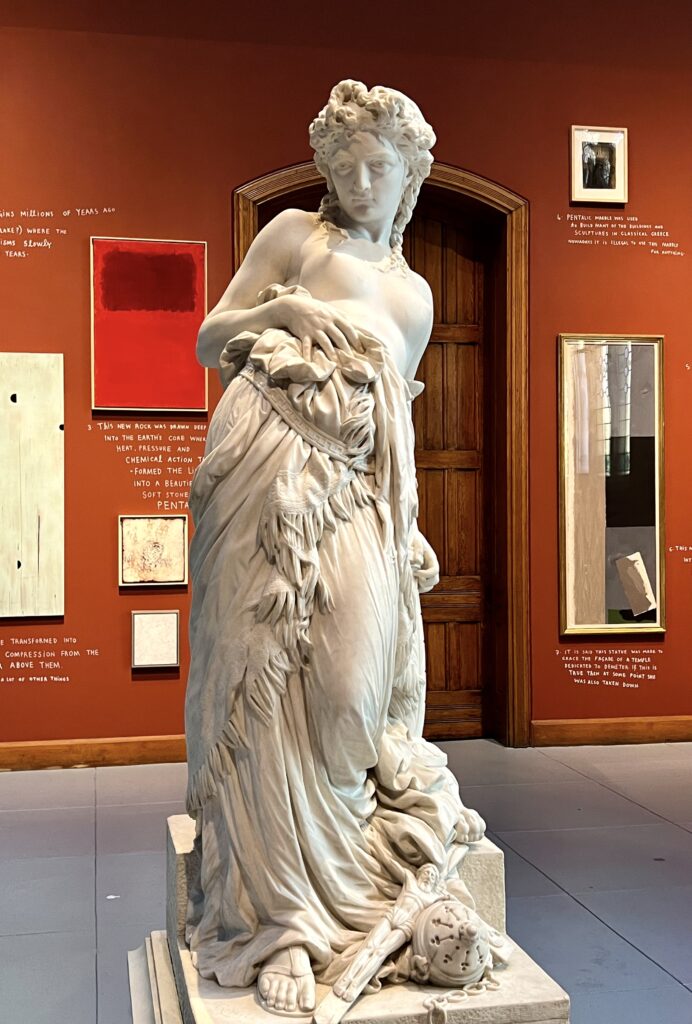 classical sculpture of a woman in the museum