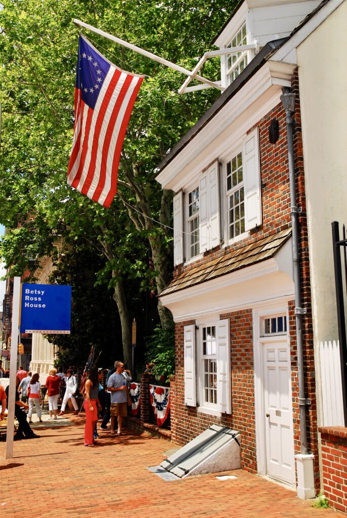 exterior of the Betsy Ross House with the Betsy Ross flag