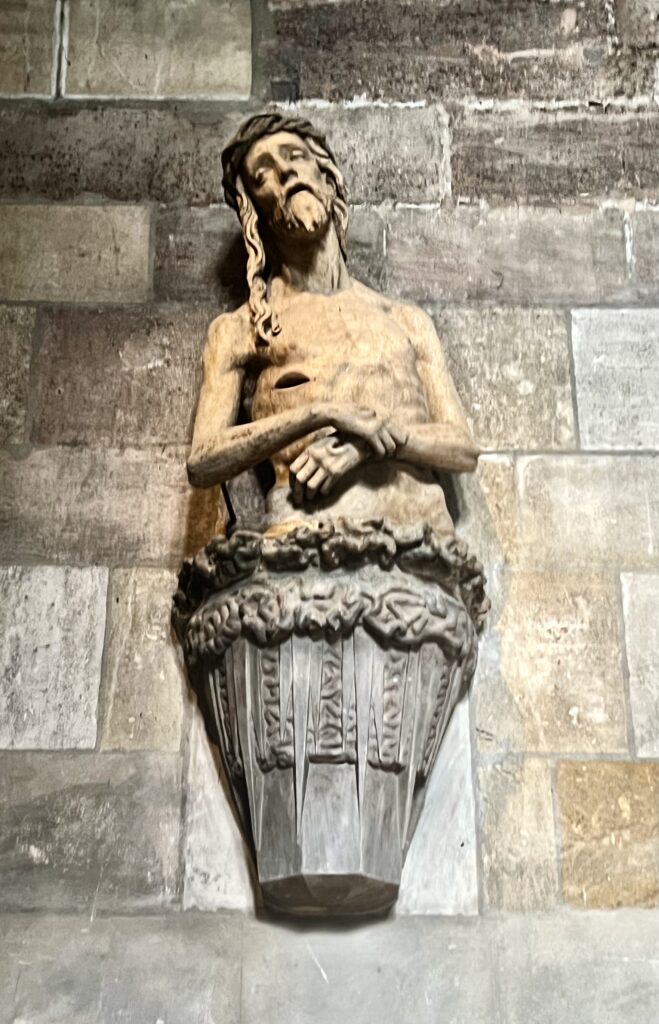 a statue of Christ referred to as "Christ with a Toothache"