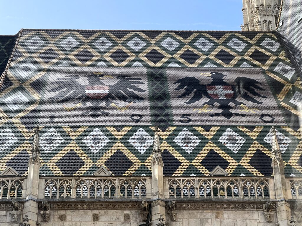 coats of arms on tiled roof