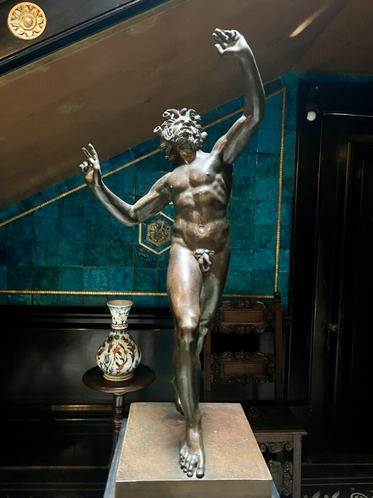 sculpture of Dancing Faun in the Staircase Hall
