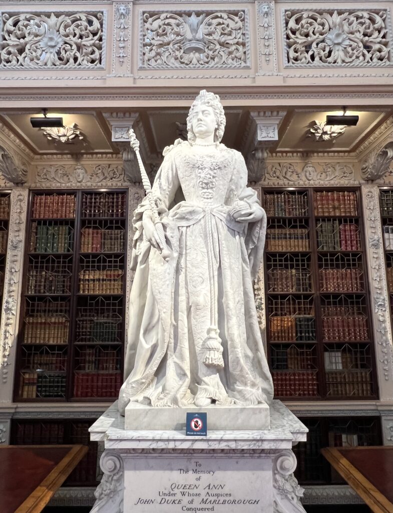 statue of Queen Anne in the Long Library