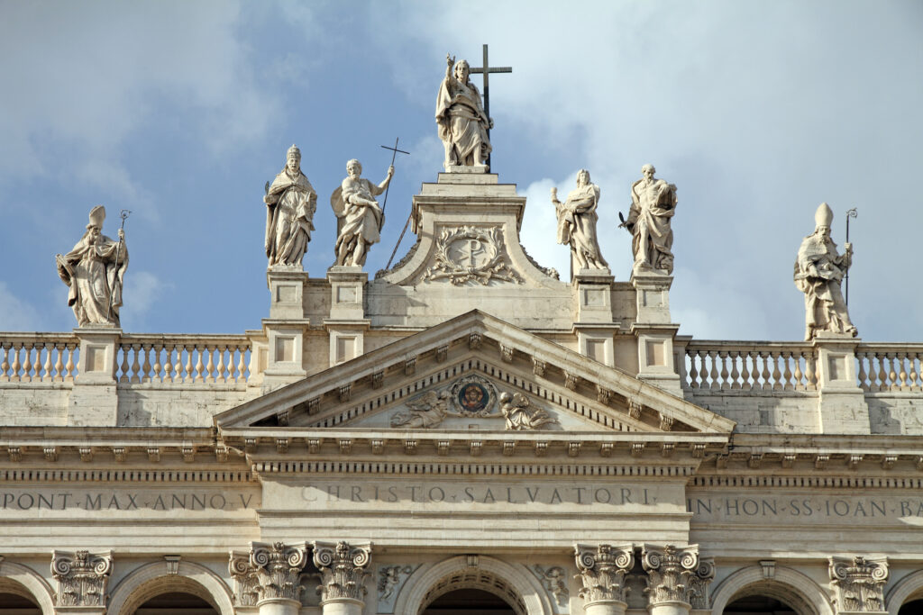 sculptures at the top of the facade