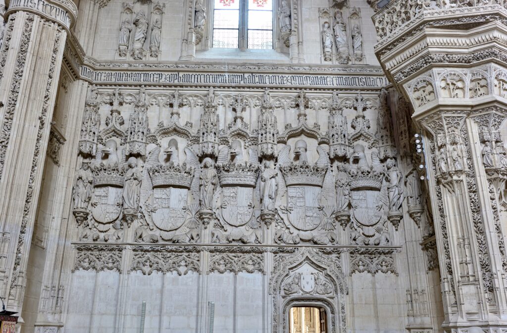 church transept with the coats of arms of the Catholic monarchs