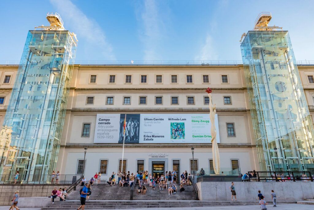 facade of the Reina Sofía Museum with glass elevators