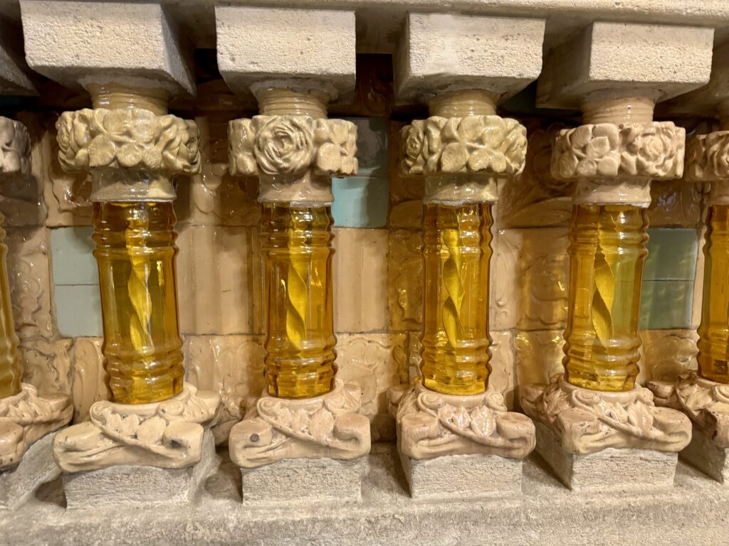 golden balusters on the staircase