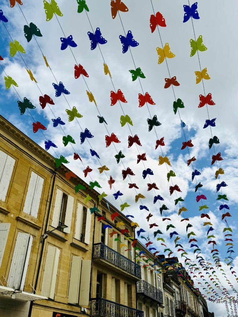 tree with butterfly streamers above