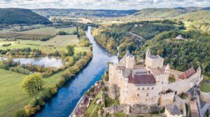 aerial view of Chateau de Beynac and the Dordogne River