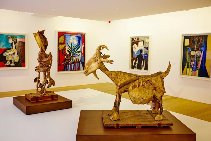 gallery in the Picasso Museum with paintings and sculptures