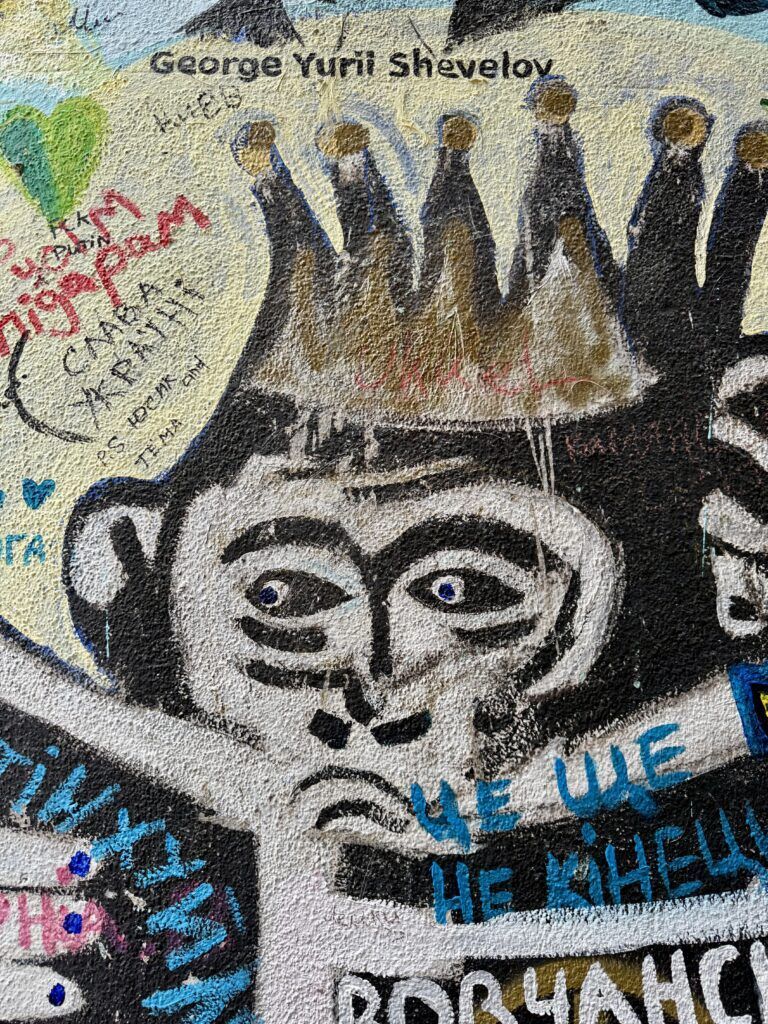 street art mural of a gorilla with a crown