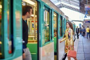 woman getting on the metro in Paris