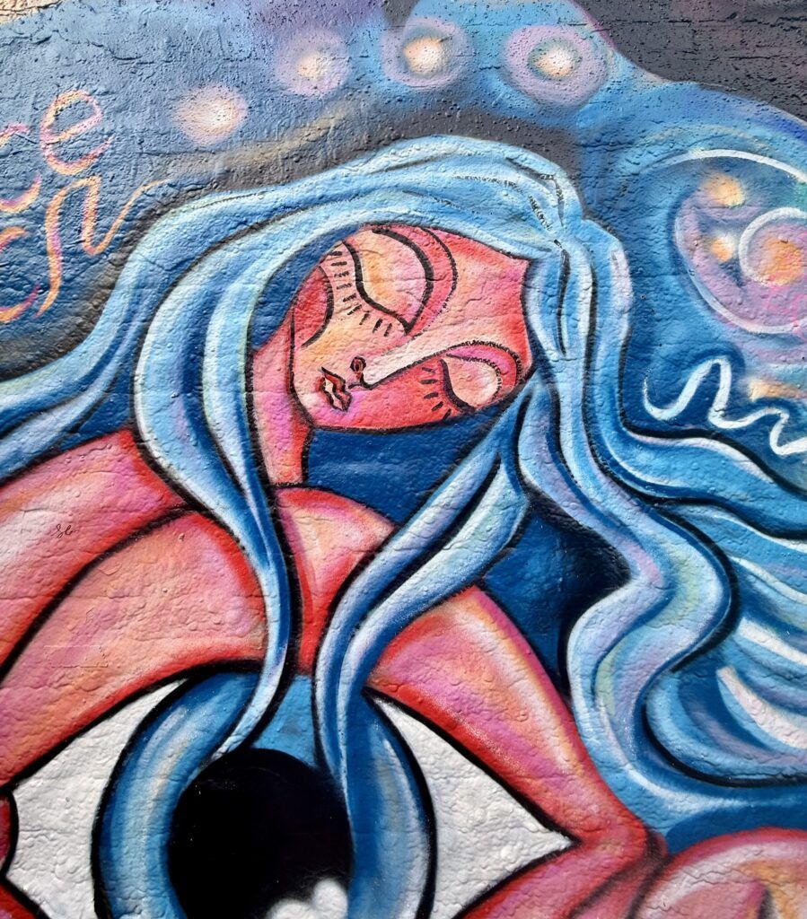 curl of woman on Graffiti Street