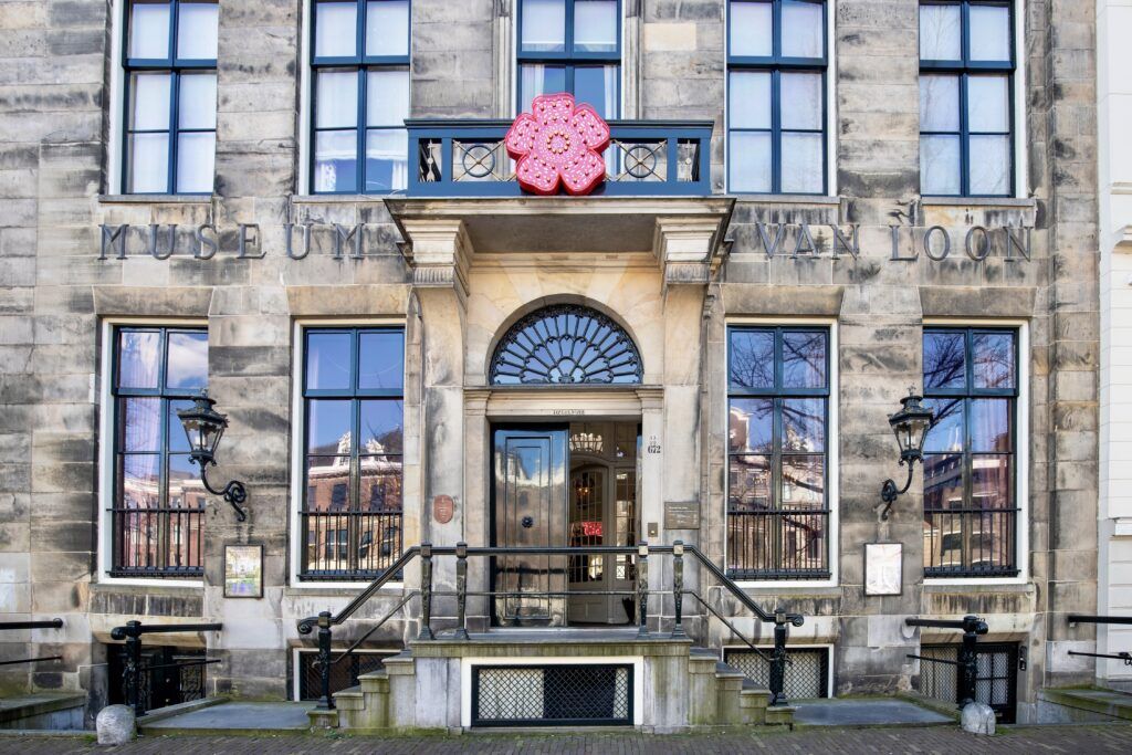 gray sandstone exterior facade of the Van Loon Museum