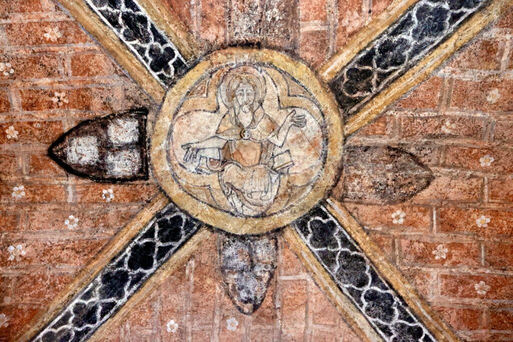 faded medieval fresco in teh crypt