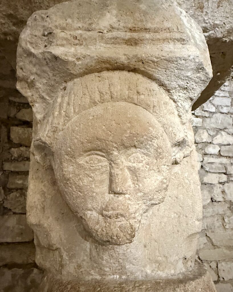 stone bust of a monk