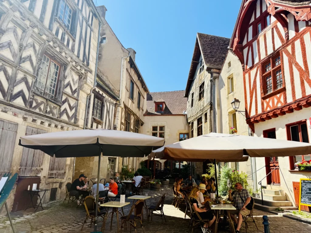 cafe and half-timbered houses in Noyers