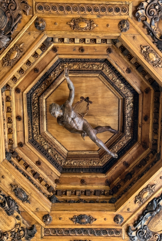 sculpture of Apollo on the ceiling